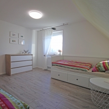 Zwei-Bett Schlafzimmer im OG